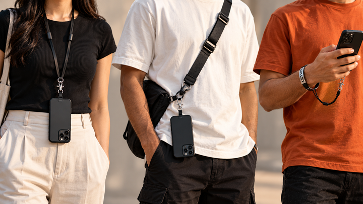 Three ways to carry a phone compared: neck lanyard, crossbody lanyard and wrist tether