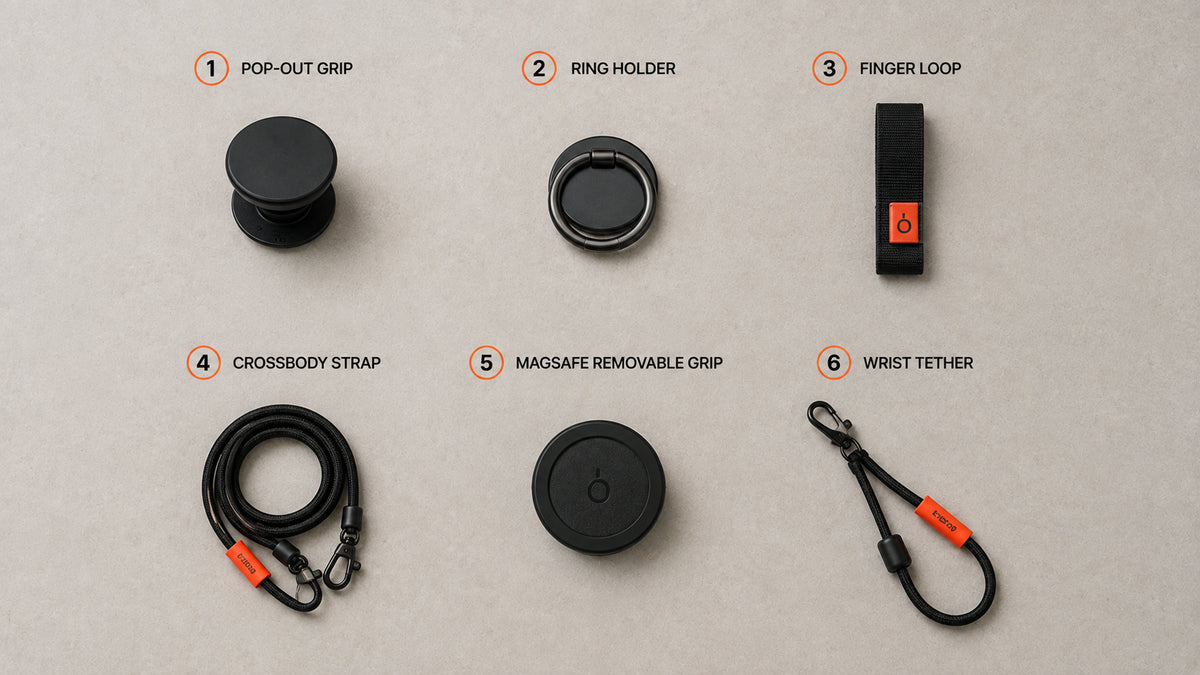 PopSockets-style collapsible phone grip attached to the back of a smartphone held in one hand