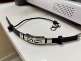 PHLOOP Active Silicone bracelet phone holder laid flat showing the band, cord and clasp