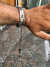 PHLOOP Elite Stainless Steel bracelet phone holder, side view of the steel band and swivel clasp